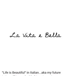 the words la vita e bella written in black ink