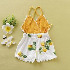 Summer FUN in this gorgeous lemon romper. Every beauty needs this. Floral Print Cotton Jumpsuits And Rompers For Summer, Cotton Floral Print Jumpsuits And Rompers For Summer, Cute Summer Floral Print Bubble Romper, Chic Cotton Floral Print Jumpsuits And Rompers, Summer Cotton Bubble Romper With Floral Print, Summer Bubble Romper With Floral Print, Summer Floral Print Cotton Bubble Romper, Spring Bubble Romper For Garden Party, Cute Floral Print Bubble Romper For Beach