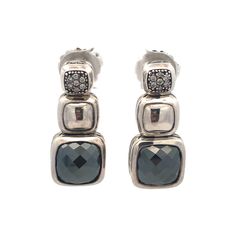 David Yurman 925 Sterling Silver Albion Cushion Cut Hematite Diamond Earrings Length: 1-1/8" Width: 7/16" - 1/4" Weight: 6.8 tgw each Cushion cut hematite stones measure approximately 9.35 x 9.35 x 2.5 mm each 14 round diamonds measure approximately 1 mm each. Closure: Butterfly back Marked: D.Y. * 925 Condition: As pictured. Please see our listing # ____ for matching pendant. CN55 Fine Jewelry Cushion Cut Gemstone Earrings, David Yurman Earrings Studs, David Yurman Amulet, David Yurman Jewelry, Hematite Stone, David Yurman, Cushion Cut, Fine Jewellery Earrings, Round Diamonds