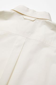 Short sleeve button-up shirt is cut to a relaxed fit and below hip length. Crafted from cotton and detailed with front patch tapes. FN-MN-SHIR000742 Short Sleeve Button Up, Hip Length, White Shirt, Button Up Shirts, Button Down Shirt, Button Up, Organic Cotton, Relaxed Fit, Wardrobe