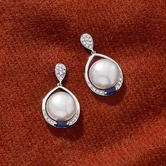 Ross-Simons - 10.5-11mm Cultured Pearl, .30ct t. w. Sapphire Drop Earrings, Diamond Accents. Simply lovely. These shimmery drop earrings feature lustrous 10.5-11mm cultured freshwater button pearls, sparked by .30 ct. t. w. sapphire baguettes and diamond accents. Crafted in luxurious 14kt white gold. Post/clutch, sapphire and white pearl drop earrings. Pearl birthstones are the perfect gift for June birthdays. Elegant Round Platinum Pearl Earrings, Anniversary White Gold Platinum Pearl Earrings, Classic White Gold Gemstone Bridal Earrings, Classic White Gold Bridal Earrings With Gemstones, Silver Platinum Pearl Earrings For Anniversary, Formal Round Gemstone Bridal Earrings, Formal Gemstone Bridal Earrings, Round Shape, White Diamond Gemstone Earrings For Formal Occasions, Formal White Gold Pearl Earrings With Gemstone