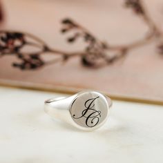 A personalised solid silver engraved initial ring makes a timeless essential piece of jewellery to treasure. A unique custom engraved solid silver signet ring that's perfect for a landmark birthday, such as 18th or 21st birthday gift for a son or grandson. The silver ring is solid silver, the back is not hollow, it's solid throughout, and hallmarked in the UK for your assurance of quality.  Initials are laid out in gently overlapping script fonts. CHOOSE YOUR FINISH Choose to have your signet ri St Christopher Necklace, Solid Gold Charms, Travel Necklace, Silver Gold Jewelry, Silver Bracelets For Women, Signet Rings, Solid Gold Necklace, Silver Signet Ring, Mens Jewelry Necklace