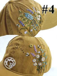 two hats with embroidered flowers on them, one is brown and the other is tan