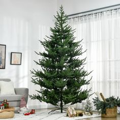 a living room with a christmas tree in the corner and presents on the floor next to it