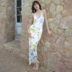 Features: Indulge in effortless style with our Sexy Backless Floral Print Slip Maxi Dress. Perfect for beach vacations or summer outings, this dress features a stunning floral print, sleeveless design, and elegant backless detail. Stay cool and chic all season long with this must-have addition to your wardrobe. Backless Maxi Dress For Brunch During Beach Season, Fitted Sleeveless Beach Dress For Brunch, Casual Backless Dress With Spaghetti Straps For The Beach, Beach Sleeveless Backless Sundress, Backless Sleeveless Sundress For Beach, Floral Print Beachy Maxi Dress For Brunch, Beachy Floral Print Maxi Dress For Brunch, Summer Backless Maxi Dress For Brunch, Summer Maxi Backless Dress For Brunch