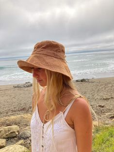 Wide Brim Sun Hat in Rust Linen Fabric for Women With - Etsy Trendy Cotton Sun Hat For Vacation, Solid Bucket Hat For Beach Season, Solid Color Bucket Hat For Beach Season, Trendy Bucket Hat For The Beach, Trendy Bucket Hat For Beach, One Size Fits Most, Trendy Beach Bucket Hat One Size Fits Most, Adjustable Cotton Bucket Hat For Beach Season, Adjustable Solid Color Bucket Hat For Beach, Adjustable Solid Color Bucket Hat For Beach Season