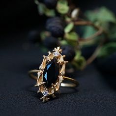 Inspired by Milan Cathedral, this ring is adorned with a natural marquise black onyx and embellished with natural white diamonds. Handcrafted in 14K gold and 18K gold. 14K or 18K solid gold 10*5mm Natural black Onyx Natural round diamonds. 0.02ct. SI clarity, GH color 1.4mm ring band ** This item is specially made for you. Please allow 1-2 week lead time. Shipping:Domestic: Free standard shipping within the U.S.International: Free standard shipping for orders over $200Customization:- Interested Goth Engagement Rings, Milan Cathedral, Gothic Engagement Ring, Onyx Engagement Ring, Cute Engagement Rings, Dope Jewelry, Black Diamond Ring, Dream Engagement Rings, Fancy Jewellery