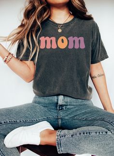 "Comfort Colors Mom T-shirt, Retro Mom Shirt, Personalized Mom Tee Shirt, Custom Mama Shirt, Mother's DAy T-shirt, Gift for Mama https://toptrendtshirtsus.etsy.com NOTE: Please contact me for more size,color, product (sweatshirt, hoodies,kids etc) options. I'm always here to help. Unisex Garment-Dyed T-shirt Comfort Colors® 1717 *Medium fabric (6.1 oz/yd² (206.8 g/m *Relaxed fit *Sewn-in twill label *100% ring-spun cotton About Comfort Colors introduces its garment-dyed t-shirt; a fully customiz Cute Relaxed Fit T-shirt As Gift, Relaxed Fit Cotton T-shirt As Gift, Mother's Day Graphic Tee With Funny Text, Multicolor Cotton T-shirt With Funny Text, Mother's Day Funny Text Graphic Tee, Mother's Day Screen Print Crew Neck T-shirt, Mother's Day Crew Neck Tops With Funny Text, Mother's Day Graphic Tee With Text Print, Multicolor Graphic Tee T-shirt As Gift