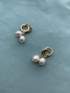 Creamy light creamy white, natural 1) Very Small or 2) Small teardrop oval real pearls and mounted on lovely period appropriate loops in 16k gold or silver plated brass loops: great soft close, stay on well and great for sensitive ears (lead free, nickel free). These small real pearl earrings were inspired by the pair that Kate Middleton, Duchess of Cambridge, British royalty wears on a regular basis! THIS LISTING is a CUSTOMER FAVORITE! MEASUREMENTS:Earrings measure about 1" longVERY SMALL: 7.2 Gold Hypoallergenic Pearl Huggie Earrings, Elegant Nickel-free Teardrop Huggie Earrings, Delicate White Hoop Earrings With Pearl Charm, White Pearl Huggie Earrings With Pearl Charm, Pearl Teardrop Hoop Earrings For Gift, Pearl Teardrop Hoop Earrings As Gift, Teardrop Pearl Hoop Earrings For Gifts, Teardrop Hoop Earrings With Pearl Pendant, Teardrop Hoop Earrings With Pearl Pendant As Gift