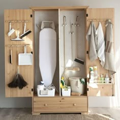 a wooden cabinet filled with lots of bathroom items