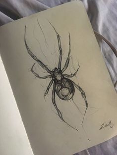 a drawing of a spider sitting on top of a bed