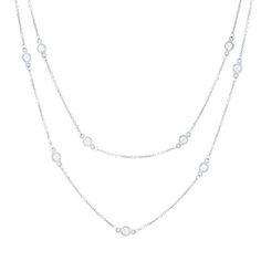 A staple in any jewelry collection this necklace features round brilliant cut diamonds in bezel stations. Classic Diamond White Necklace With Bezel Setting, Classic Sterling Silver Necklace With Bezel Setting, Timeless Diamond White Necklaces With Bezel Setting, Sterling Silver Diamond Necklace With Bezel Setting, Fine Jewelry Sterling Silver Diamond Necklace With Bezel Setting, Classic Sterling Silver Diamond Necklace With Bezel Setting, Classic Sterling Silver Necklace With Rose Cut Diamonds, Classic Sterling Silver Rose Cut Diamond Necklace, Cubic Zirconia Diamond Necklace With Bezel Setting