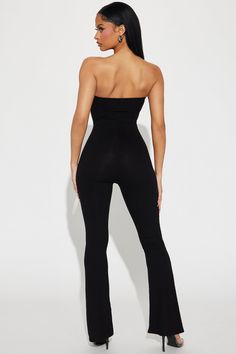 Available In Black. Ribbed Jumpsuit Strapless Flare Leg Stretch 93% Rayon 7% Spandex Imported | Christy Ribbed Jumpsuit in Black size Large by Fashion Nova Stretch Strapless Elastane Jumpsuit For Night Out, Stretch Elastane Strapless Jumpsuit For Night Out, Stretch Strapless Jumpsuit In Solid Color, Black Stretch Ribbed Jumpsuits And Rompers, Ribbed Bodysuit For Night Out, Black Strapless Fitted Jumpsuit, Black Fitted Strapless Jumpsuit, Black Fitted Strapless Jumpsuit In Elastane, Black Fitted Strapless Elastane Jumpsuit