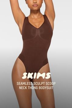 This scoop neck sculpting thong bodysuit enhances your natural shape while defining and smoothing your waist, core, tummy, and back. Features thick non-adjustable straps, center front and side stitching to define and support your bust, and a cotton gusset with snap closure. Fits true to size. | SKIMS Scoop Neck Thong Bodysuit | Deep Neutral | 2XS | Seamless Sculpt Sculpting Push-up Bodysuit With Built-in Bra, Fitted Seamless T-back Bodysuit, Fitted T-back Seamless Bodysuit, Shapewear Bodysuit With Seamless Construction, Stretch Seamless Push-up Bodysuit, Sculpting Full Coverage Bodysuit With Seamless Construction, Solid Color Shaping Leotard With Seamless Construction, Sculpting Full-coverage Seamless Bodysuit, Solid Sculpting Shapewear With Seamless Construction