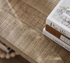 a book sitting on top of a wooden table