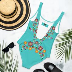 This one-piece swimsuit for all figures will bring out your best features. Enjoy the smooth fabric and the flattering design, and show it off by the sea or pool! • 82% Polyester, 18% Spandex • Fabric weight: 6.78 oz/yd² (230 g/m²), weight may vary by 5% • Chlorine-resistant fabric • Cheeky fit with a scoop neckline and a low scoop back • Zig-zag stitching • Double-layer front • Four-way stretch material stretches and recovers on the cross and lengthwise grainsSize guide CHEST (inches) WAIST (inches) HIPS (inches) XS 33 ⅛ 25 ¼ 35 ⅜ S 34 ⅝ 26 ¾ 37 M 36 ¼ 28 ⅜ 38 ⅝ L 37 ¾ 29 ⅞ 40 ⅛ XL 41 33 ⅛ 43 ¼ 2XL 44 ⅛ 36 ¼ 46 ½ 3XL 47 ¼ 39 ⅜ 49 ⅝ Summer Pool Bodysuit With Lined Body, Green Beachwear Bodysuit For Beach, Summer Style Lined Bodysuit For Pool, Green Summer Bodysuit For Surfing, Green Bodysuit For Surfing In Summer, Tropical Swimwear For Pool With Lined Body, Beach Season Stretch Leotard For Sunbathing, Stretch Leotard For Beach Season Sunbathing, Stretch Leotard For Sunbathing At The Beach