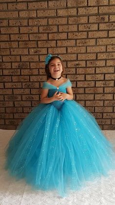 Princess Style Glitter Tulle Dress For Pageant, Blue Princess Gown For Party, Blue Princess Style Party Gown, Princess Style Blue Gown For Party, Princess Style Glitter Tulle Dress, Blue Princess-style Fitted Ball Gown, Princess Style Fitted Ball Gown Tutu Dress, Princess-style Fitted Ball Gown Tutu Dress, Princess Dress-up Dresses In Glitter Tulle