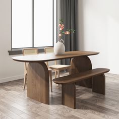 a wooden table with two benches in front of it and a vase filled with flowers