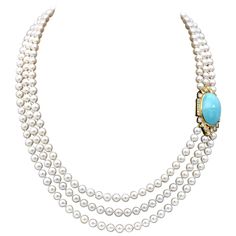 Very elegant opera necklace: thee stands of white peals closing with a yellow gold clasp which is also the adornment of this piece. It consists of a 27mm long turquoise set in yellow gold and surrounded with approximately 2.2 carats of top quality diamonds. The clasp measure 41mm - 1.61in / 23mm -91in Matches the earrings ref: LU47232268313 1stdibs Jewelry, Opera Necklace, Jewelry With Pearls, Pearl Cocktail Ring, Pearl And Diamond Necklace, Pearls Jewelry, Cultured Pearl Necklace, Winter Chic, Pearl Necklaces