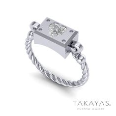 a white gold ring with a diamond in the center and a rope design around it