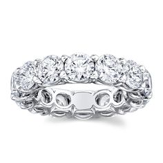 a white gold ring with round cut diamonds