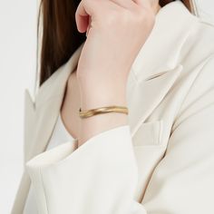 Statement chunky snake style gold bracelet. This bracelet is a perfect statement piece. You can wear it alone or layer it with other gold bracelets. A perfect addition to your jewelry collection! ………………………………….D E T A I L S• Materials: Stainless steel, 18k gold plating.• Length: 6 inches (15 cm) + extension 1.9 inches (5 cm)• Width: 5 mm• This product is hypoallergenic, water and tarnish resistant Elegant Everyday Gold-tone Bangle, Elegant Snake-shaped Chain Bracelet Gift, Modern Gold Bracelet In Snake Chain Style, Elegant Matte Gold Plated Bracelet, Elegant Matte Gold-plated Bracelet, Elegant Matte Gold Tarnish-resistant Bracelets, Elegant Matte Gold Bracelet, Chic Gold Cuff Bracelet With Bracelet Strap, Elegant Gold Snake Chain Bracelet