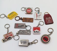 a bunch of key chains that are on a table