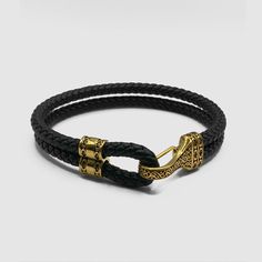 The devils in the detail. Finished with a filigree engraved lobster clasp, the leather rope bracelet will break up the metal and add new levels to your look. Wear it solo or stack it with any gold bracelet of your choice for an instantly elevated look. ✓ Vegan Leather ✓ 18K Gold & 316L Stainless Steel✓ Water, Heat, Sweat Resistant✓ Hypoallergenic (No Green Skin) Classic Jewellery, Green Skin, The Devils, Men's Bracelets, Classic Jewelry, Mens Leather, Bracelet Gold, Silver Man, Real Diamonds