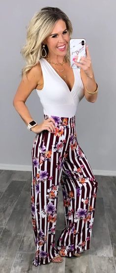 Flowy Striped boho wide leg pants that can be styled so any ways for moms on the go to boss babes for work shown here with a bodysuit. These are great for layering and transitional weather and style year round! #fallfashion #momstyle #bohostyle #styleideas Versatile Stretch Harem Pants For Spring, Spring Stretch Wide-leg Jumpsuits And Rompers, Chic Stretch Jumpsuits And Rompers With Trousers, Stretch Jumpsuits And Rompers With Elastic Waistband, Trendy Summer Stretch Harem Pants, Trendy Stretch Harem Pants For Summer, White Stretch Wide Leg Jumpsuits And Rompers, White Stretch Wide Leg Jumpsuit, Spring Stretch Trousers Jumpsuits And Rompers