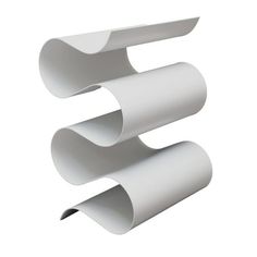 a white shelf with three sections on it and one section in the shape of a spiral