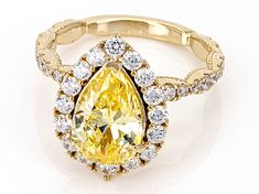 Bella Luce® canary and white diamond simulants 8.25ctw pear and round, Eterno™ 18k yellow gold over sterling silver ring. Measure approximately 0.88" L x 0.69" W and is not sizeable. The diamond equivalent weight is 5.00ctw. Yellow Pear Shaped Fine Jewelry Rings, Fine Jewelry Yellow Pear-shaped Ring, Gia Certified Yellow Gold Teardrop Jewelry, Gia Certified Yellow Gold Pear-shaped Jewelry, Gia Certified Pear-shaped Yellow Gold Jewelry, Yellow Gold Teardrop Jewelry With Halo Setting, Yellow Gold Teardrop Halo Jewelry, Gold Pear-shaped Halo Jewelry, Gold Teardrop Jewelry With Center Stone