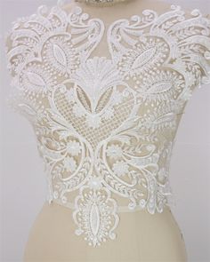 This listing is for 1pcs elegant lace applique. Perfect for bridal dress lace, wedding dress, bridal veil decoration Size:17.71 inch * 17.32 inch/ 45cm*44cm Material: Polyester, Sequins, Beaded Color: Off white QTY: 1PCS Product Code: MKE Shipping: Lace applique shipped in two ways: International post and express delivery. When you purchase goods to pay for shipping, you can choose any of them. International post Time: US orders about 7-15 business days, Europe orders about 7-20 business days. E White Fitted Lace Wedding Dress, Fitted White Lace For Bride, White Fitted Lace For Bride, Fitted White Bridal Lace, White Lace Wedding Dress With Lace Patchwork, White Scalloped Lace For Bride, Bridal Vale, Gown Embroidery, Lace Inspiration