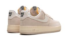 The Nike Air Force 1 Low "Athletic Dept. " is a colorway of the retro basketball shoe with a tan-based, versatile appearance.  From Nike’s “Athletic Department” collection, the Air Force 1 Low seen here features a beige suede construction and white leather Swooshes on either side.  Classic “Nike Air” branding designed in vintage-style lettering is seen on the heel while a “Nike Air Force 1” logo appears on the tongue tag of the beige-colored nylon tongue with exposed foam.  A cream white rubber Retro Basketball Shoes, Retro Basketball, 1 Logo, Nike Air Force 1 Low, Stadium Goods, Air Force 1 Low, Vintage Vibe, Nike Air Force 1, Air Force 1