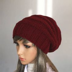 Our hand-knitted slouchy beanie is the perfect stylish accessory for any season. Made from soft yarn, it is not only beautiful but also warm and comfortable. Available in a variety of colors, you can pick from our color chart to match your personal style. For faster shipping and tracking, upgrade to Global Express for an extra charge. We ship all orders via registered airmail, with delivery times varying depending on your location. Shop our full range of products at our Etsy store, WoolyThinker. Knitted Hats One Size Fits Most For Everyday, Casual Slouchy Beanie Cap, Slouchy Knit Hat One Size, One Size Slouchy Knit Hat, Knitted One-size Acrylic Bonnet, Knitted Acrylic Bonnet, One Size Fits All, Knitted Acrylic Bonnet One Size, Knitted Acrylic Bonnet In One Size, One Size Everyday Beanie Hat