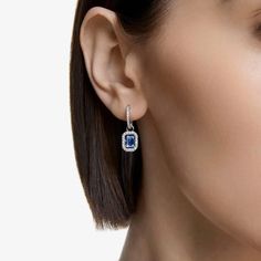 Encircled by graceful white pavé crystals, this pair showcases a central blue dancing cubic zirconia, complemented by a rhodium-plated setting, finished off with a subtle post-fastening. Length: 2.3cm Width: 0.8cm Weight: (Individual Piece): 1.5g Item Code: 5619500 Swarovski Millenia, Bracelet Tennis, Pink Watch, Crystal Drop Earrings, Swarovski Jewelry, Blue Gemstones, Metal Bracelets, Pierced Earrings, Blue Crystals