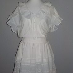 Lauren Ralph Lauren Black Label Misses Size 6 Cotton Casual Dress True White In Color V-Neckline With Ruffle And Tie Sleeveless Ruffle Trim Smocked Waistline Layered Skirt Lined 100% Cotton Cpmer Fitted Vintage Smocked Dress For Summer, Prairie Dress With Smocked Bodice And Short Sleeves, Vintage Smocked Summer Dress With Ruffles, Vintage Smocked Ruffle Dress For Summer, Summer Peasant Dress With Smocked Bodice For Daywear, Fitted Short Sleeve Smocked Dress With Lace Trim, Summer Peasant Dress With Smocked Back For Daywear, Fitted Peasant Prairie Dress, Vintage Summer Dress With Smocked Cuffs