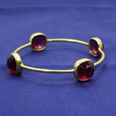 Pink Tourmaline Hydro Gemstone Bangle Bracelet- Handmade Gold Bangle- Parywear Jewelry- Dainty Bangle- Anniversary Gifts- Stackable Bangle Description : ~ Material : Brass & Gemstone ~ Gemstone : Pink Tourmaline Hydro ~ Stone Size : 6 x 6 mm Approx ~ Weight : 11.87 Gram Approx ~ Setting Type : Bezel ❣❣ Handmade Item ❣❣ **Made to Order** » G EM S T O N E D E T A I L « **Gemstone structure may vary from the image as two gemstones do not have the same structure** If you want to see the picture Adjustable Crystal Bangle Bracelet With Jewels, Adjustable Jeweled Crystal Bangle Bracelet, Party Bracelets With Stone Setting, Stone Bangle Bracelets For Parties, Round Gemstone Bangle For Party, Stone Bangle Bracelet For Party, Party Bangle Bracelets With Stones, Party Bangle Bracelet With Stones, Adjustable Gemstone Bracelets For Party