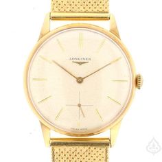 Description: Add a touch of luxury to your watch collection with this vintage 18K Longines watch. Crafted from 18K yellow gold, this watch is a true statement piece with its intricate design and attention to detail. Specifications: Metal: 18K Yellow Gold Weight: 66.7g Brand: Longines Item Code: 891250 Classic Gold Watch With Diamond Hour Markers, Yellow Gold Diamond Watch With Round Dial For Anniversary, Anniversary Yellow Gold Diamond Watch With Round Dial, Classic Yellow Gold Watches With Polished Finish, Timeless Yellow Gold Watch With Rectangular Dial, Classic Yellow Gold Watch Accessories With Subdials, Yellow Gold Watches With Chronometer And Rectangular Dial, Formal Yellow Gold Diamond Watch With Round Dial, Formal Yellow Gold Diamond Watch