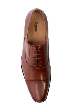 Tonal stitching subtly highlights the cap toe of a classic oxford fashioned from smooth, burnished leather. Lace-up style Leather upper/textile lining/synthetic sole Imported Dune London, Mens Oxfords, Leather Lace, Up Styles, Men's Fashion, Leather Upper, Oxford, Highlights, Stitching