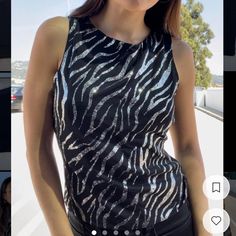 Shorter Length Makes It So Flattering. Straight Out Of Storage, Never Worn, New With Tag, No Flaws. I Can’t Express Enough How Perfect This Top Is!! Says L, But There’s No Stretch So I Would Say S/M Length: 20.5” Width: 16” #Vintage #Zebra #Y2k #Retro #Womens Demi Lovato Workout, Black Zebra Print Party Top, Zebra Print Tank Top, American Flag Tank Top, Adidas Crop, Grey Tank Top, Casual Short-sleeved Tiger Print T-shirt, Sleeveless Tee, Muscle Tank Tops