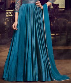 Deep Teal Blue Designer Embroidered Satin Anarkali Gown-Saira's Boutique Blue Zari Work Anarkali Set Maxi Length, Blue Floor-length Gown For Eid, Blue Anarkali Maxi Set, Blue Anarkali Set With Traditional Drape, Blue Anarkali Maxi Length Set, Blue Maxi Length Sharara With Dupatta, Traditional Blue Maxi Length Sharara, Blue Anarkali Set For Reception, Blue Anarkali Floor-length Sharara