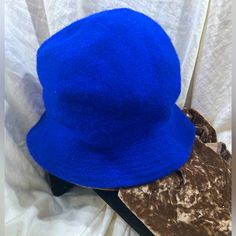 Vintage 100% Wool Blue Fuzzy Bucket Hat One Size Wide Brim Cap Made In Hong Kong. New Never Worn In Great To Excellent Condition. Nwot.. Ven.23 Blue Flat Brim Bucket Hat One Size, Blue Flat Brim Bucket Hat, Blue Winter Bucket Hat, Casual Blue Felt Hat With Flat Brim, Casual Adjustable Blue Felt Hat, Blue Winter Bucket Hat With Curved Brim, Vintage Blue Bucket Hat With Short Brim, Blue Vintage Bucket Hat With Short Brim, Adjustable Blue Cloche Hat With Flat Brim