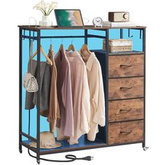 PRICES MAY VARY. Upgraded Tall Dresser with Clothes Rack: This upgraded tall dresser features a handy clothes rack for hanging daily clothes. The 4 larger drawers offer ample space to store up to 100 socks, 50 coats or jeans. 4 side hooks create additional storage space to hang bags or umbrellas on side or on bottom. High Quality: Strong steel frame, durable wood board, adjustable plastic feet and premium fabric drawers all contribute to its sturdy construction to ensure durability against wear and tear over time. The overall dimension is 42.3'' L x 15.7'' W x 44.1'' H; The drawer dimension is 14.6'' W x 15.0'' D x 7.7'' H. Easy Assembly: Hardware is included for hassle-free assembly. Follow the instruction and you can put it together in a few steps. It mixes & matches with Somdot storage Dressing Cabinet, Drawers For Closet, Closet Wood, Closet Hallway, Organizing Items, Hang Bags, 5 Drawer Dresser, Closet Drawers, 4 Drawer Dresser