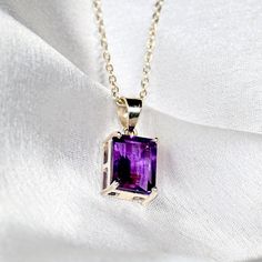 Natural Amethyst Square Shape Women's Pendant With Silver Chain/Beautiful Gift For Wife Necklace/Gift for Pendant/Purple Stone Necklace. "At the heart of this pendant lies a captivating amethyst Square Shape cut stone, chosen for its exceptional clarity and brilliance. Each stone is carefully selected to ensure that it radiates a luminous glow, captivating the eye and capturing the imagination. Crafted with meticulous attention to detail, this pendant is housed within a sterling silver setting, providing a durable yet elegant foundation for the dazzling gemstone. The design is imbued with intricate detailing, adding depth and dimension to the piece and enhancing its regal charm. Whether worn as a statement piece for a special occasion or as an everyday accessory to elevate your ensemble, t Purple Jewelry With Adjustable Chain As Gift, Purple Necklace With Adjustable Chain For Gift, Purple Jewelry With Adjustable Chain For Gift, Elegant Purple Rectangular Necklace, Purple Clavicle Chain Pendant Necklace, Rectangular Purple Amethyst Necklaces, Purple Rectangular Amethyst Necklaces, Purple Rectangular Jewelry As A Gift, Purple Rectangular Jewelry For Gifts