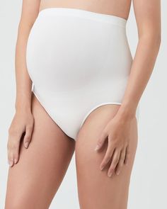 Our high-waisted Seamless Briefs are super comfortable and feature under-tummy ribbing for extra support. Polyamide / Elastane Seamless knit Under tummy ribbing Length: 19cm side seam (size small) White Shapewear With Medium Bust Support, White High-waist Smoothing Shapewear, White Smoothing Full Coverage Bottoms, White High Waist Smoothing Shapewear, Seamless High Waist Bodysuit In Solid Color, Supportive White Full Coverage Shapewear, White Seamless High-cut Leg Shapewear, White High Waist Seamless Shapewear, Supportive Full Coverage White Bottoms