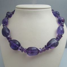 "For sale: (1) d950 Amethyst Necklace PLEASE READ ENTIRE DESCRIPTION BEFORE PURCHASING Pre-owned item. Good condition. Please see pictures for details. Sold as is, as seen on pictures. This necklace is stamped. Specifics: Screw clasp Length: 23.5 inches Width: 17 mm Total Weight: 124.5 grams Please be 100% sure of your purchase before buying, as we do not offer refunds. We are more than happy to provide any specific pictures, or answer any questions you have regarding our items. All jewelry is c Classic Amethyst Purple Necklace, Classic Purple Amethyst Necklace, Formal Purple Amethyst Necklace, Luxury Amethyst Necklaces With Natural Stones, Luxury Amethyst Necklace With Natural Stones, Formal Amethyst Gemstone Bead Necklace, Elegant Amethyst Stone Necklaces, Formal Amethyst Necklaces With Stones, Formal Amethyst Jewelry With Stones