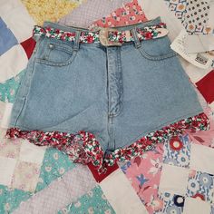 New With Tag Vintage 90s Shorts With Floral Trim & Removable Belt. Size 9 Juniors But Please See Measurements Waist 24 Inches Length 12 Inches Fitted Jean Shorts With Belt Loops For Spring, Retro Denim Jean Shorts For Summer, 90s Style Levi's Bottoms For Spring, Levi's 90s Style Spring Bottoms, Levi's Cotton Jean Shorts For Spring, Retro High Waist Jean Shorts For Summer, Retro High-waist Jean Shorts For Summer, 90s Inspired Denim Jean Shorts For Spring, Retro Medium Wash Jeans For Summer