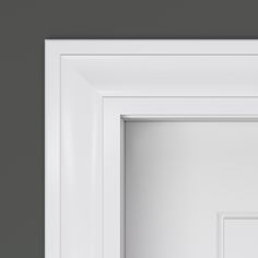 an open white door on a gray wall