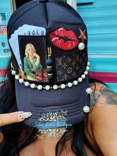 Lady Luck Trucker Hat – Julee Rae's Boutique 59fifty Hats Custom New Era Cap, Bandana Under Hat, Red Yankees Hat Outfit, Locs And Hats, Diy Trucker Hat Ideas, Custom Hat Ideas, Trucker Hats With Patches, Trucker Hat Ideas, Trucker Hat Designs