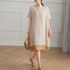 Cool and comfortable for hot summer days, this natural linen dress is elegant and stylish.    It is a wonderful wardrobe staple that's a timeless classic you'll wear again and again.Pure natural linen materials, comfortable, breathable, refreshing and soft fabric. All our items are Tailored and Handmade and Made to Order ,I can make Any Size . I design new styles every week, please collect my store. I believe that you will meet your favorite styles. ★★FEATURES Linen 55% + Cotton 45% ( Medium Wei Beige V-neck Linen Dress For Beach, Casual Linen V-neck Shift Dress, Casual V-neck Shift Linen Dress, Beige Shift Midi Dress With Short Sleeves, Summer Linen Shift Dress With V-neck, Summer V-neck Shift Linen Dress, Summer Neutral Short Sleeve Dresses, Beige Cotton V-neck Midi Dress, Summer Beige Short Sleeve Midi Dress